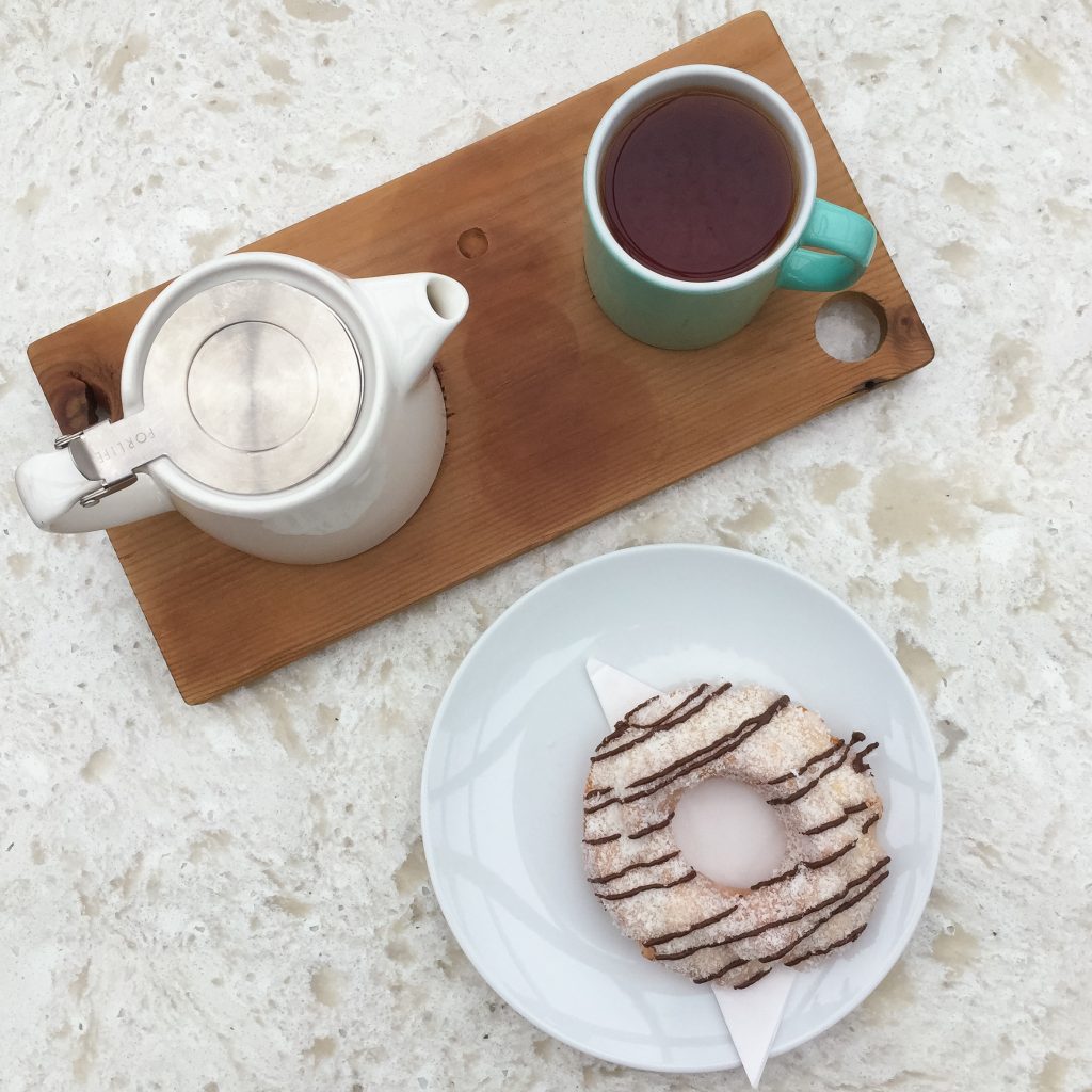 Tea and coconut lemon donut at 49th Parallel Vancouver